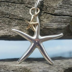 Starfish Pendant Necklace - with Solid Gold Baby by Rob Morris