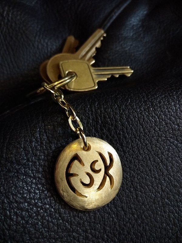 St. Christophuck Medallion Keyring by Rob Morris